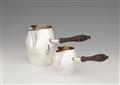 A pair of Münster silver milk jugs - image-1