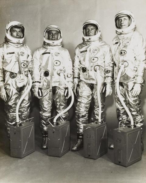 NASA - Astronauts Young, Grissom, Schirra and Stafford pose in their spacesuits after being selected for the first Gemini manned mission