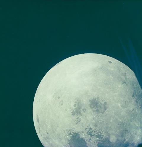 NASA - Bright lunar disc, spacecraft recedes from moon towards earth, Apollo 13