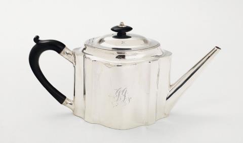 A George III London silver teapot. Marks of Hester Batmeman, 1787.