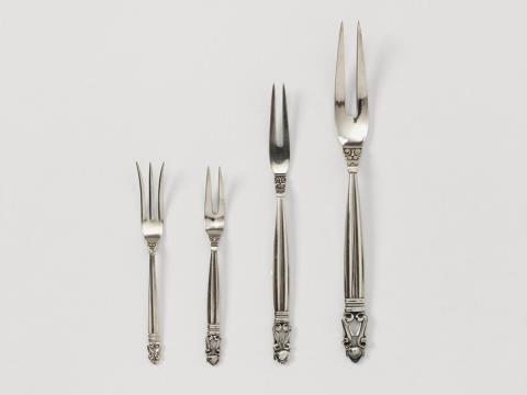 Johan Rohde - Three silver meat forks no. 62. Also enclosed: A small "Royal Danish" fork. Design Johan Rohde 1915, made by Georg Jensen from 1945 - 51.
