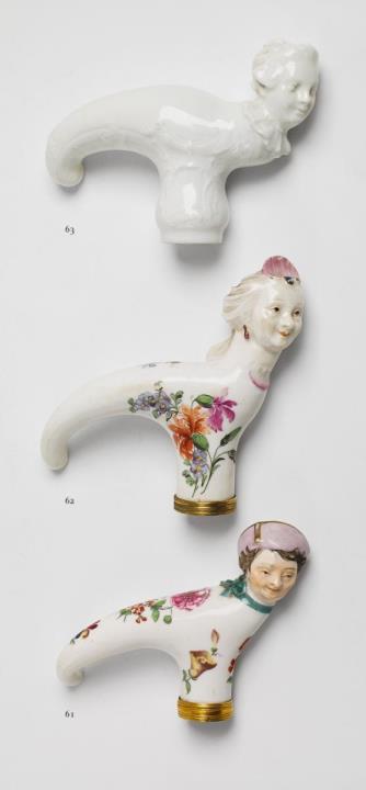 Wilhelm Caspar Wegely - A porcelain walking stick handle formed as a female head.