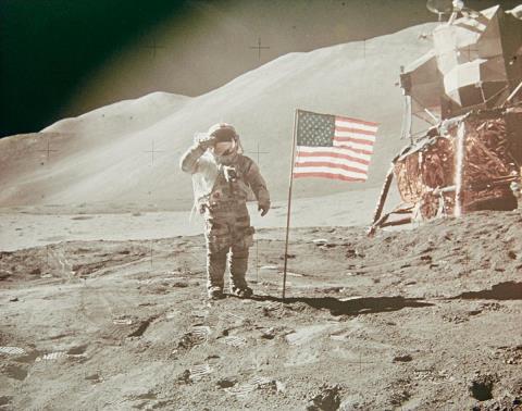 NASA - Astronaut David R. Scott saluting beside U.S. flag, Apllo 15