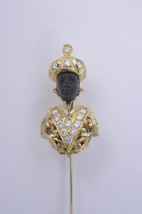 An 18k gold Venetian "moretto" tie pin.