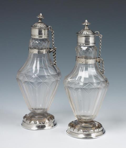 Daniel Schiller - Two Augsburg silver-mounted oil and vinegar bottles. Marks of Daniel Schiller, 1761 - 63.