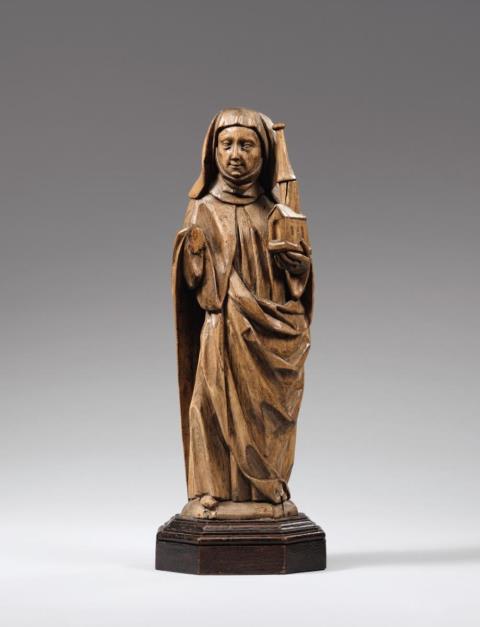  Lower Rhine Region - An early 16th century Lower Rhenish carved wooden figure of Saint Clara.