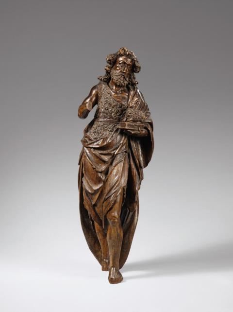 South German 17th century - A 17th century South German carved wooden figure of Saint John the Baptist.