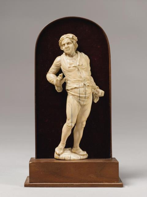 German - A German ivory figure of a man with a dagger, circa 1760/1770.