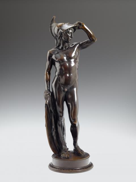 Alfred Raum - A brown patinated bronze bust of a youthful warrior (possibly Perseus).