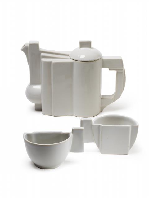 Kasimir Sewerinowitsch Malewitsch - A Suprematist white porcelain jug and two cups.