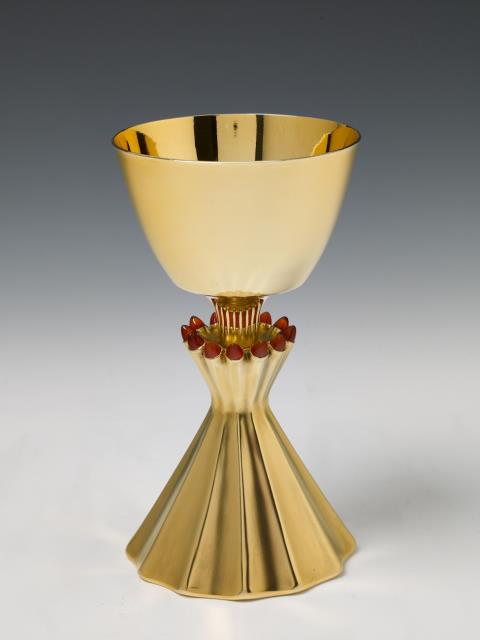 Wilhelm Nagel - A Cologne silver gilt communion chalice. Set with 12 cornelion cabochons. Marks of Wilhelm Nagel, 1956.