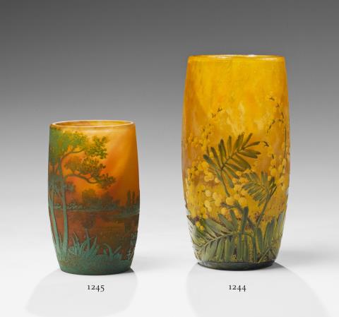 A small Daum Frères glass vase with mimosa decor.