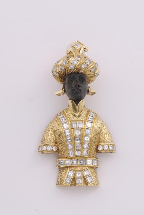An 18k gold and diamond Venetian "moretto" pendant.
