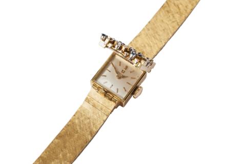  Omega - An Omega 18k gold cocktail wristwatch.