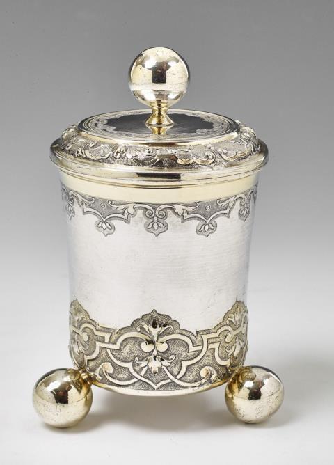 Johann Fassnacht - An Augsburg régence partially gilt silver beaker and cover