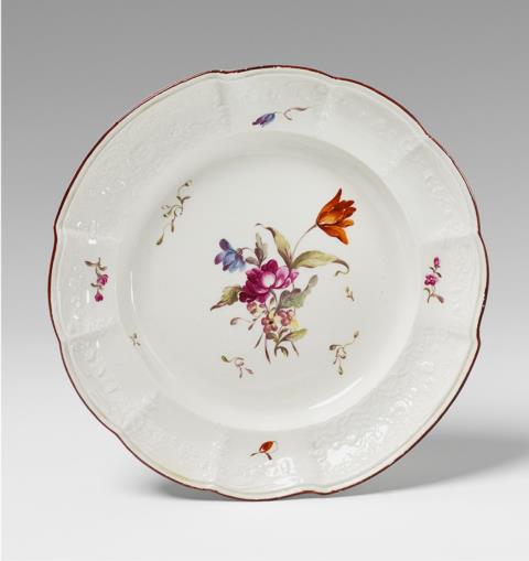 A Ludwigsburg porcelain plate with floral decor.
