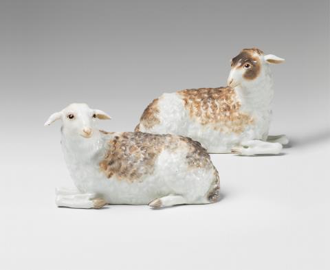 Peter Reinicke - A pair of Meissen porcelain models of recumbent sheep.
