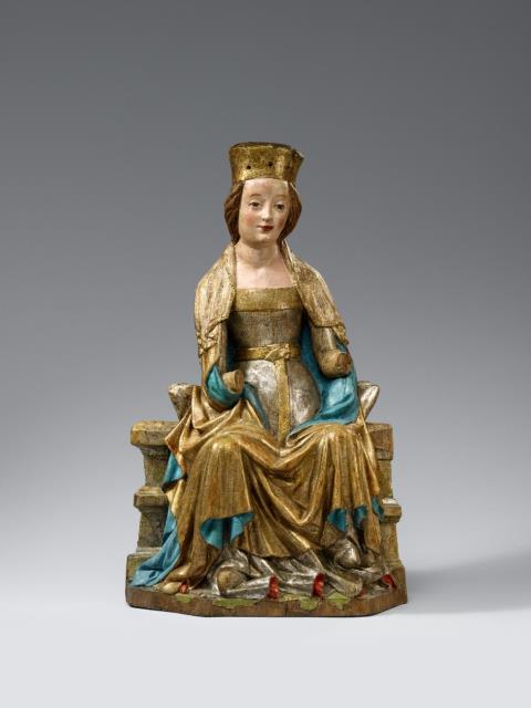  Ostdeutsch - An East German carved limewood figure of the Virgin Enthroned, circa 1380/1390.