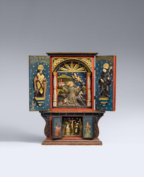 Bavaria 1549 - A small Bavarian carved wood travel altar, 1549.