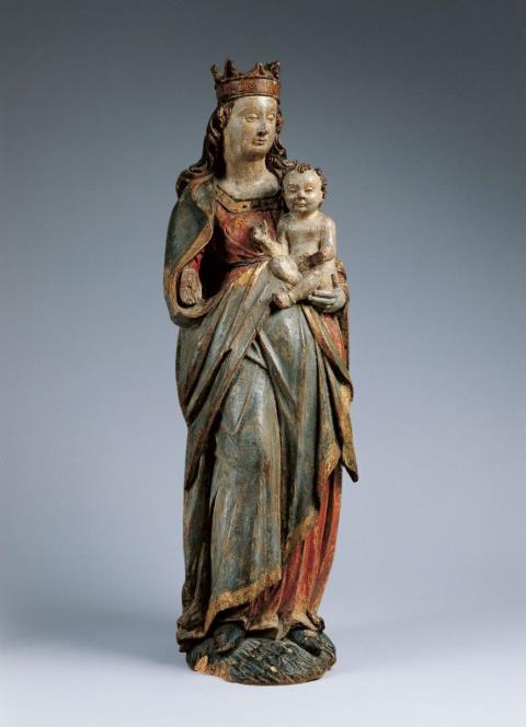 Maasland - A late 15th century probably Meuse Region carved wooden figure of the Virgin and Child.