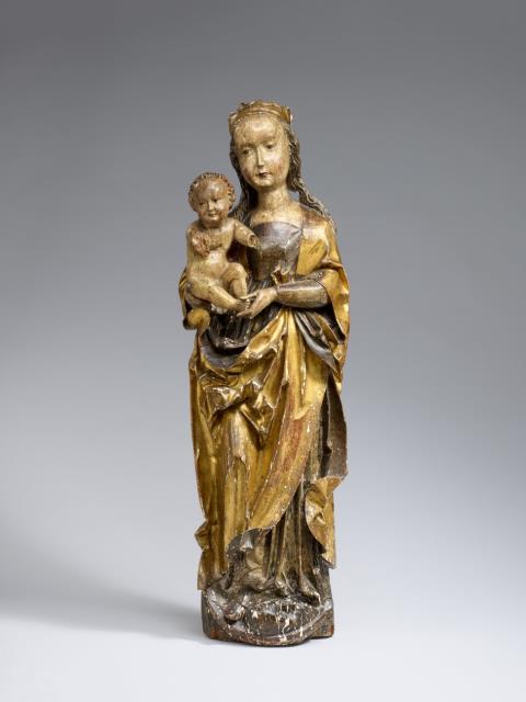  Central Germany - A presumably Central German carved wooden figure of the Virgin and Child, circa 1500/1510.