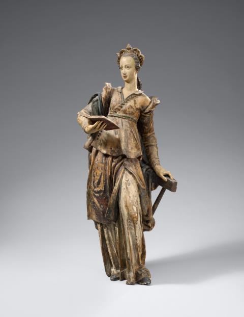 Flemish circa 1600 - A Flemish carved wooden figure of Saint Catherine, circa 1600.