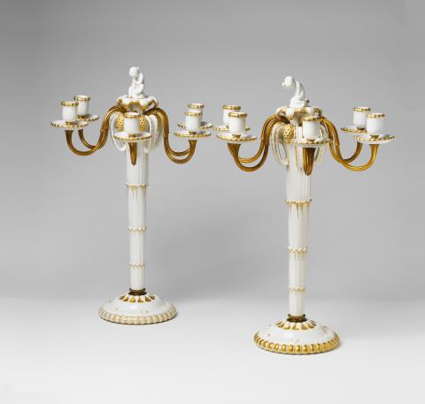 Adolph Amberg - A pair of ormolu mounted Berlin KPM porcelain candelabra from the "hochzeitszug"