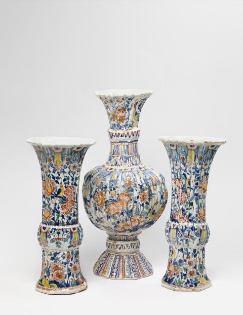 Gerhard Wolbeer - An impressive three piece set of Berlin faience vases with 'grand feu' decor