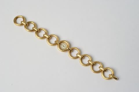 Chopard - A Chopard 18k gold ladies wristwatch with link bracelet