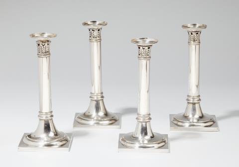 A set of four Brunswick silver candlesticks. Marks of Johan Christoph Hildebrandt, ca. 1807.