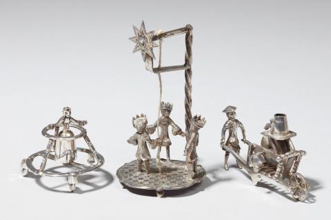 Arnoldus van Geffen - An Amsterdam silver miniature model of a child in a walker. Includes two 19th century miniatures. Marks of Arnoldus van Geffen, 1737.