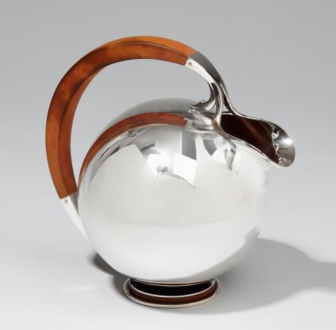 A. F. Rasmussen - An Aarhus silver water pitcher. The handle of bakelite. Marks of A. F. Rasmussen, ca. 1950