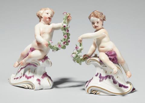 Johann Wilhelm Lanz - Two Frankenthal porcelain figures of putti with garlands