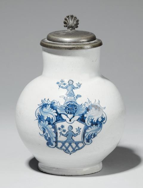  Hanau - A pewter-mounted blue and white Hanau faience pitcher