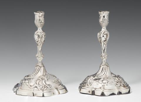 Johann Philipp Heckenauer - A pair of Augsburg Rococo silver candlesticks. Marks of Johann Philipp Heckenauer, 1777 - 79.