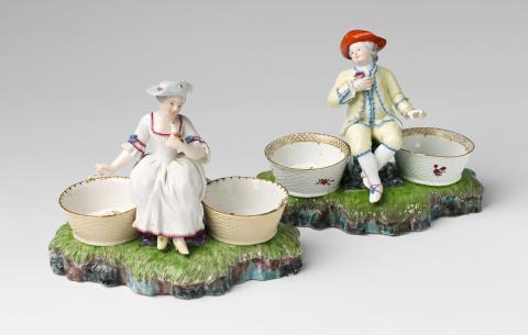 Two Höchst porcelain condiment jars with figures