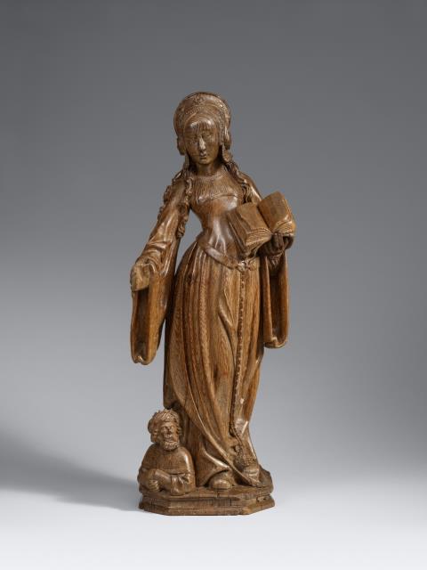  Brussels - A Brussels carved oak figure of Saint Catherine, circa 1510