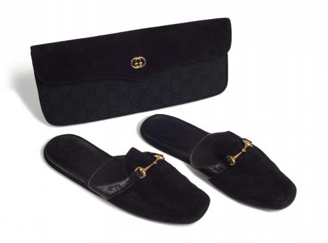  Gucci - A Gucci washbag and slippers, late 1990s