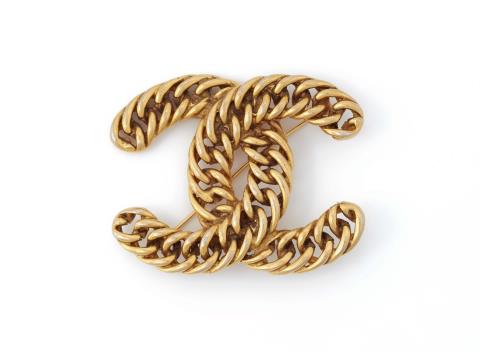  Chanel - A Chanel logo brooch, 1982