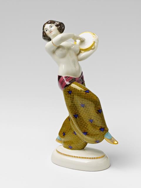 Adolph Amberg - A Berlin KPM porcelain figure of a Persian lady with a tambourine