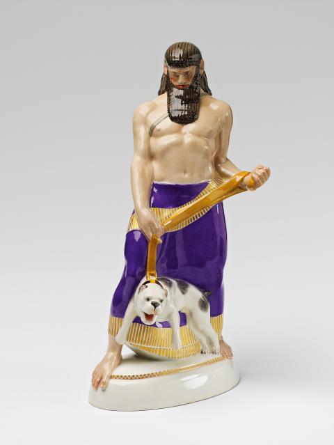Adolph Amberg - A Berlin KPM porcelain figure of an Assyrian man with a dog