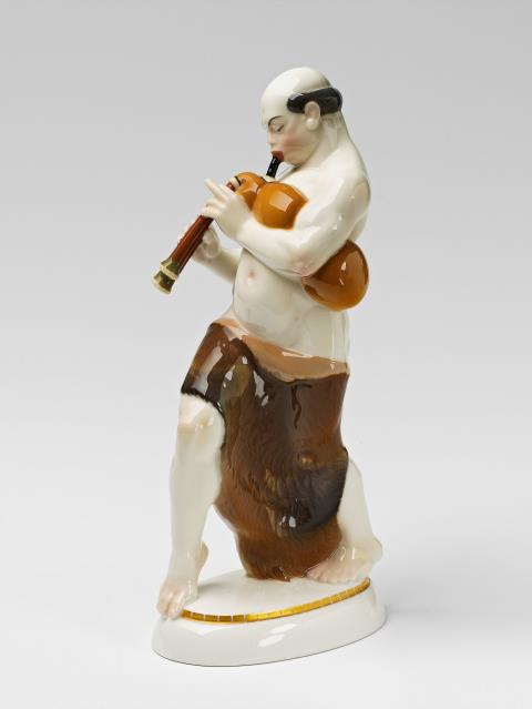 Adolph Amberg - A Berlin KPM porcelain figure of an Arab man with bagpipes