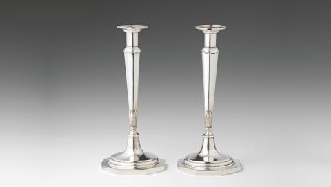 A pair of large Berlin silver candlesticks