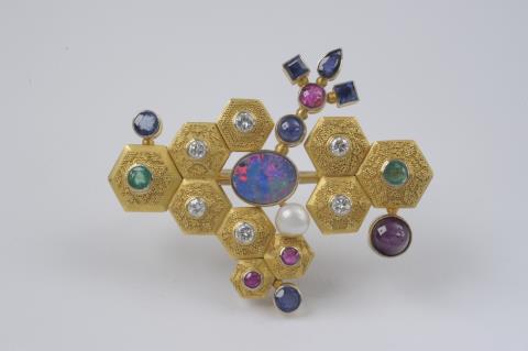 Wilhelm Nagel - An 18k gold and coloured stone brooch made by Wilhelm Nagel