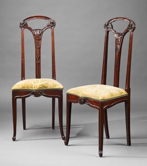 Louis Majorelle - A pair of hardwood "aux clématites" chairs after Louis Majorelle