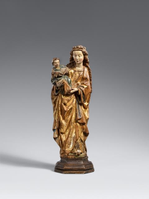  Brabant - A carved wooden figure of the Virgin and Child, presumably Brabantine, circa 1480/1490
