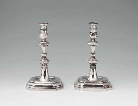 Johann Georg Quirl - A pair of Osnabrück silver candlesticks