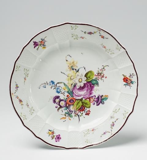  Fürstenberg - A Fürstenberg porcelain key with floral decor