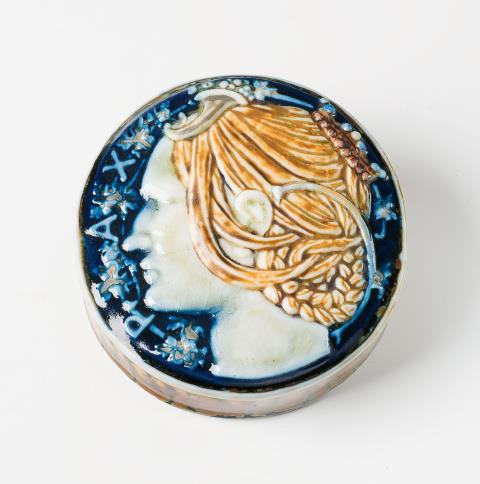 Taxile Doat - A Sèvres porcelain paperweight "Pax" by Taxile Doat