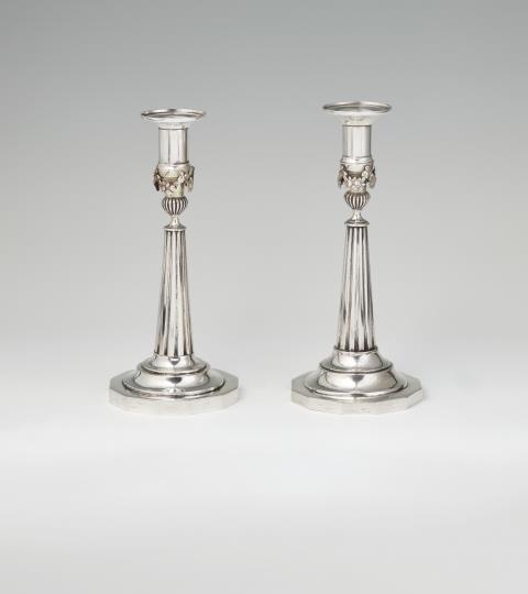 Johann George II Fournier - A pair of Neoclassical Berlin silver candlesticks